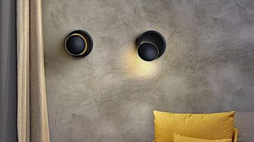 Este candeeiro de parede simula um eclipse solar para trazer luz e vida às suas paredes